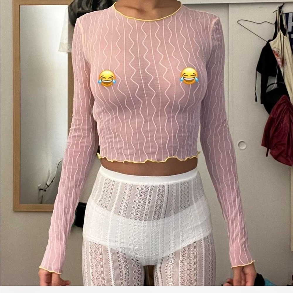 Urban Outfitters pink mesh top in size small